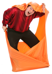 Photo of Todd breaking out of a balloon